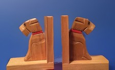 Paar Holz-Buchstützen Hunde