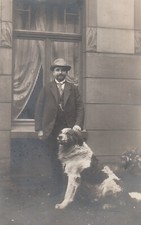 Photo postcard man with dog