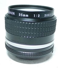 Nikon AiS Nikkor 2,0 35mm Objektiv + HN-3  Top Zustand!    An-Verkauf ff-shop24
