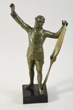 C25U18- Art Deco Metallguss Figur Pilot mit Propeller um 1930