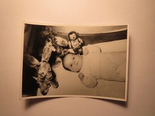 small child in bed with toy