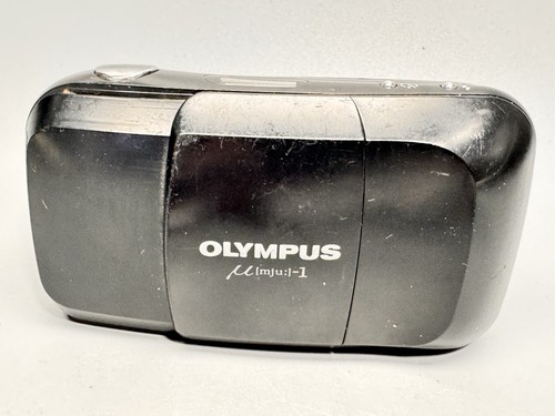 Olympus mju i - [mju:]-i), -i