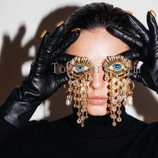 Schiaparelli Mode blaue Augen
