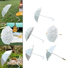 Weißer Spitzenregenschirm