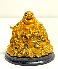 Goldene Glücksfigur –