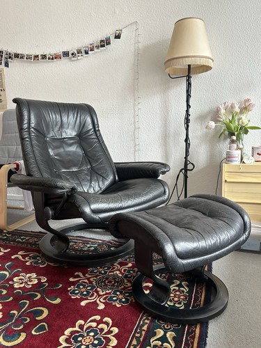 Arm chair with extra leg - chair,