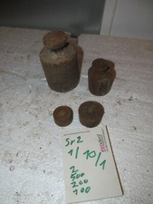 4 rostige Gewichte f