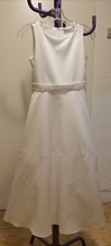Kleid für Kommunion in weiß mit Täschchen. Preis 225 Euro 