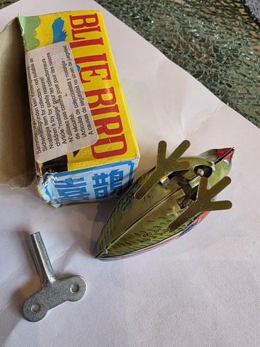 Vintage tin toy wind - tin, bird