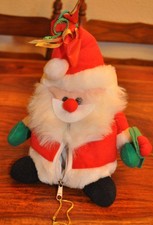 Plüschweihnachtsmann mit Reißverschluss + Innentasche, als Verpackung, ca. 22 cm