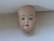 Alter Porzellan  Puppenkopf  H. ca. 7 cm , gemarkt aber unleserlich