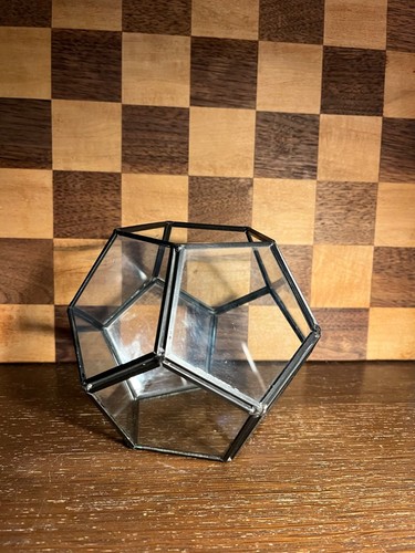 Metal and glass hexagon - and,