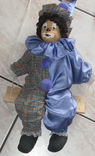 Clown auf schaukel - clown, zum