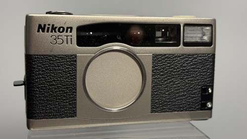 Nikon analoge point - ti,