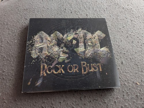 Rock bust digipak - -, or
