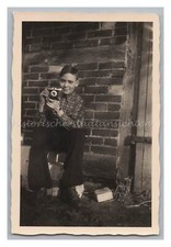 Boy with camera photo camera -