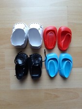 4 Paar Puppenschuhe aus