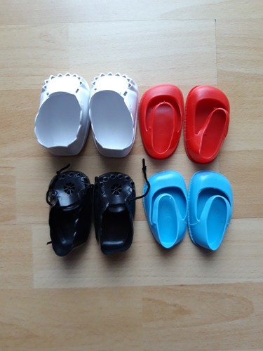 Paar puppenschuhe aus - 4,