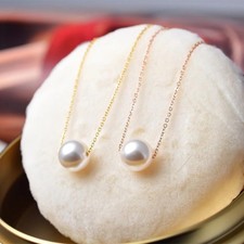 Edelstahl-Halskette mit schwebender Perle – gold- oder roségoldfarben, Damen