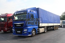 LKW Foto MAN TGX 18.440 Planensattelzug Ukraine blau Barva Avto #f4pn