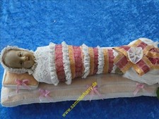 altes Fatschenkind, liegendes