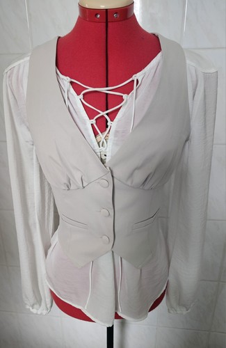 Elegante beigefarbene weste - beigefarbene,
