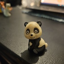 Pandabär sitzend Titelheld