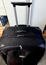 Samsonite Trolley – stabiler Reisekoffer auf 4 Rollen – Schwarz
