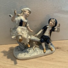 Porzellanfigur/Keramik „Junge mit Mädchen auf der Wippe“ Royal Meridian Noritake