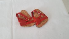 1 Paar rote Puppenschuhe