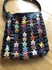 Extravagante Ledertasche mit bunten Sternen von Octopus