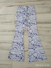 Schlaghose Gr 134/140 lila weiß gemustert mit elastischem Bund 