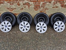 Winterräder Ford Mondeo BA7 MK5 inkl. Ford Radkappen + -muttern. 215 60 R16