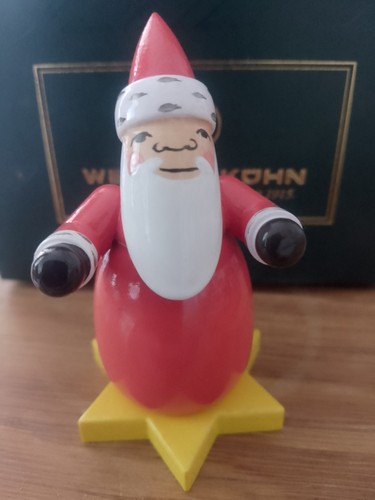 Weihnachtsmann auf stern wendt - auf,