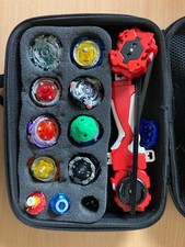 9 Beyblades plus Tasche, Starter und Zubehör