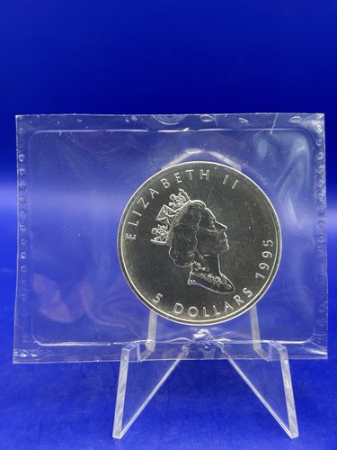 Dollar unze maple leaf - 1,