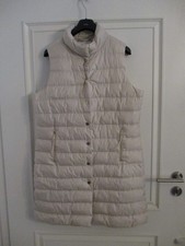 Lange, beige Steppweste Daunen