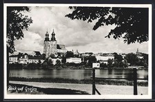 Ansichtskarte Gnesen, Ortspanorama mit Flussuferweg 