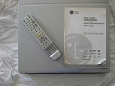LG RH7000 - DVD & HDD Recorder mit Fernbedienung und Benutzeerhandbuch