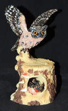 Polyresineule mit Kindern