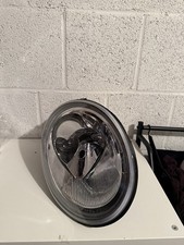 VW Beetle Scheinwerfer L 1C0941029J Bj 2000