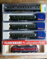 1 mal fleischmann Lokomotive , dazu 4 Passende Waggons