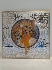 Alvons Mucha, Wanduhr, Artis