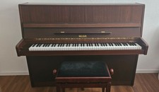 Klavier von Marke Geyer, Farbe Nussbaum, gebraucht, in einem sehr guten Zustand