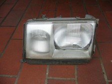 Scheinwerfer für Mercedes W 124 links Hella