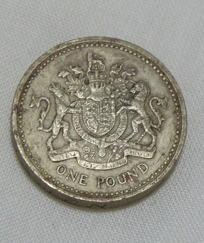 One pound 1983 queen - one,