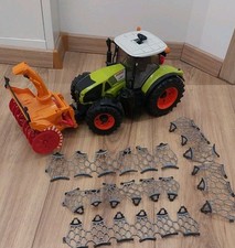 BRUDER Traktor Claas Axion 950 mit Schneeketten und Schneefräse