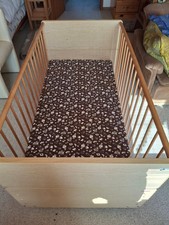 Kinderbett Combili von Herlag mit Gitter und zwei herausnehmbaren Streben