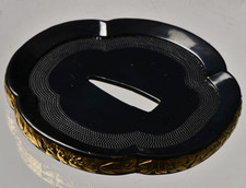 Tsuba with Black Lacquered Surface and Gilded Rim Decoration