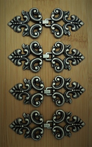 Paar gewandhaken - 9,